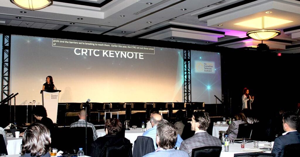 A speaker delivering a keynote address at The Canadian Telecom Summit